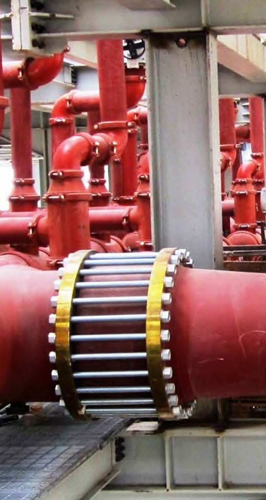 Red fire-fighting pipework with flanged connections